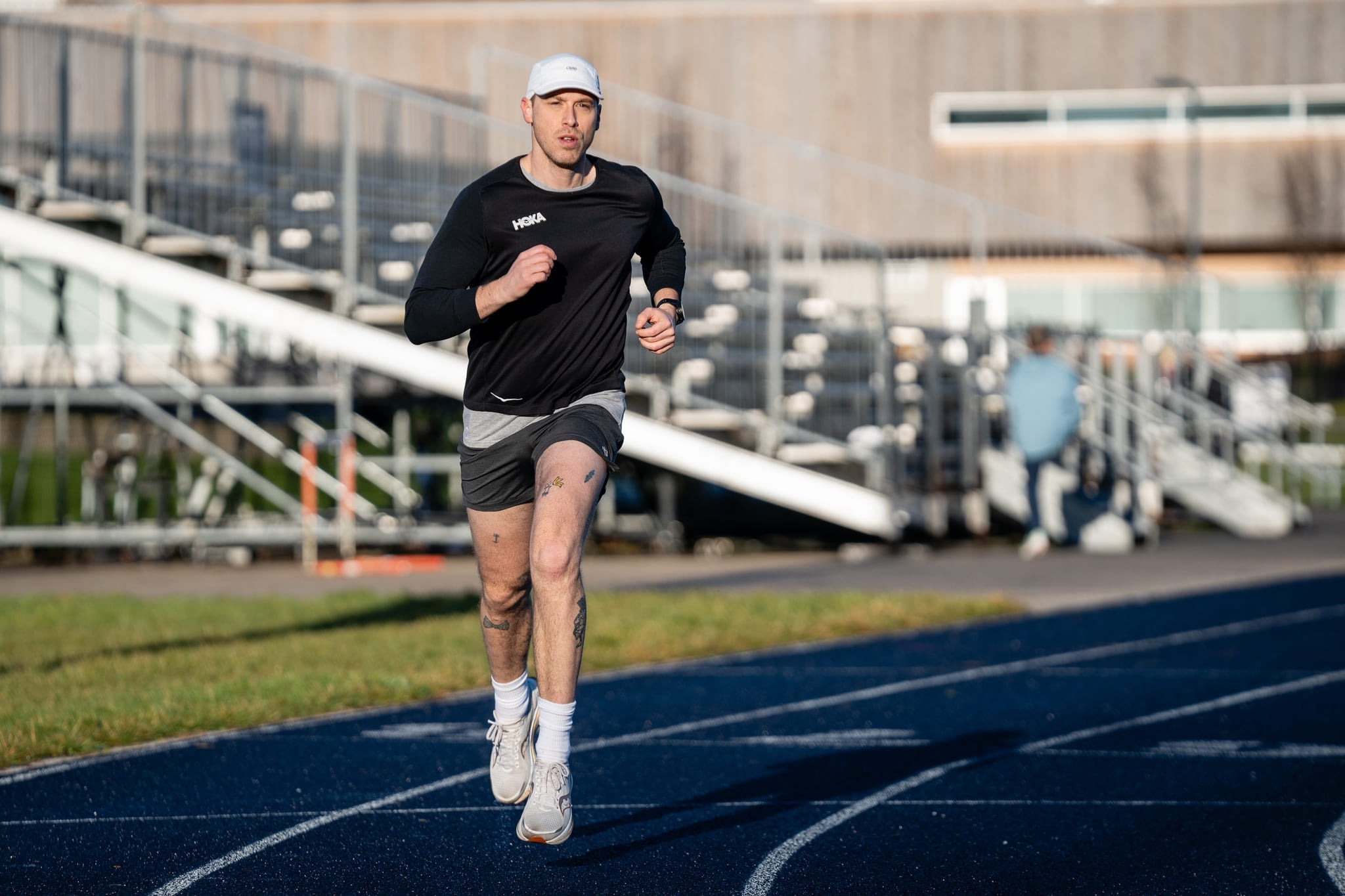 A Runner Sprints on a Track