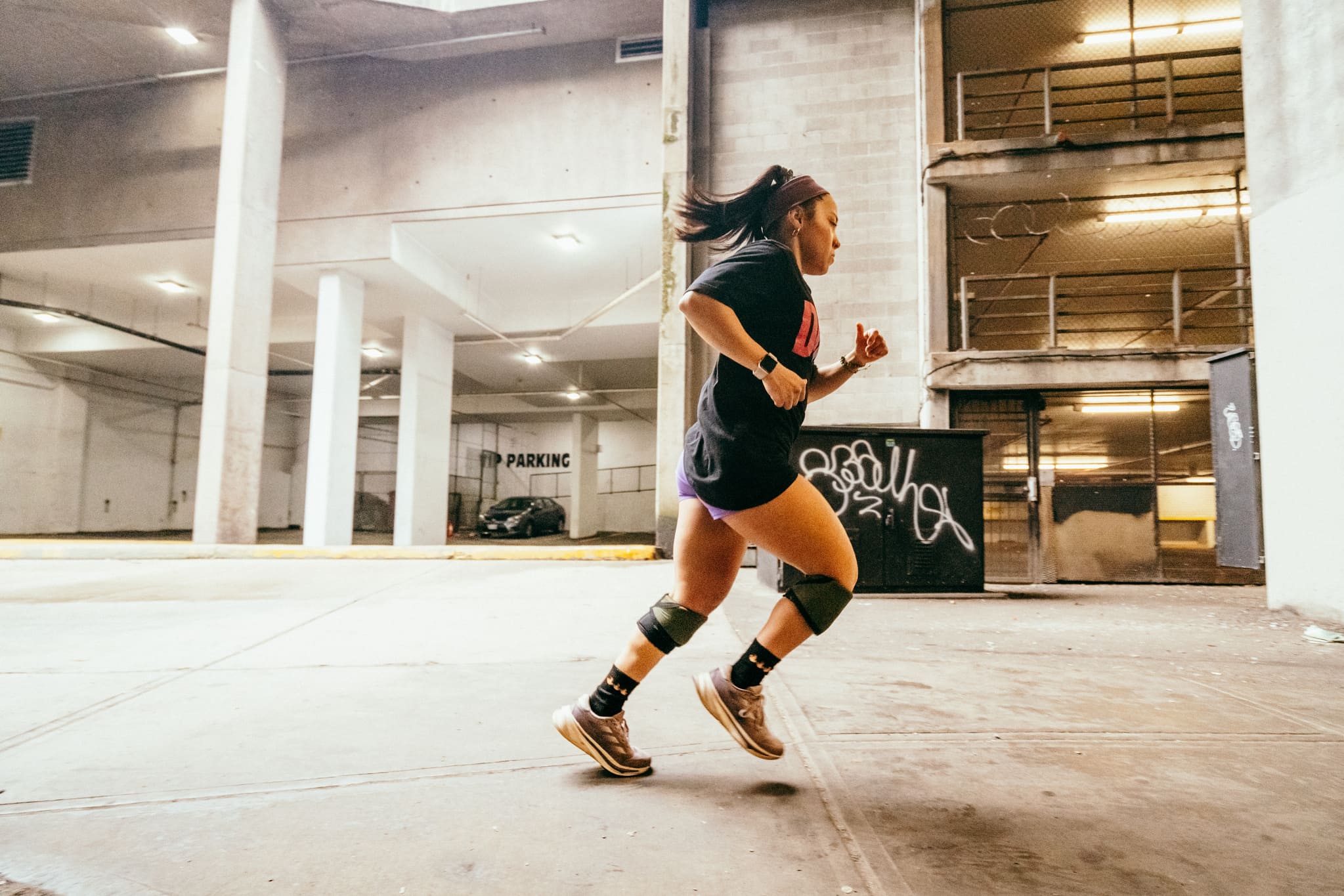 Woman running in a city