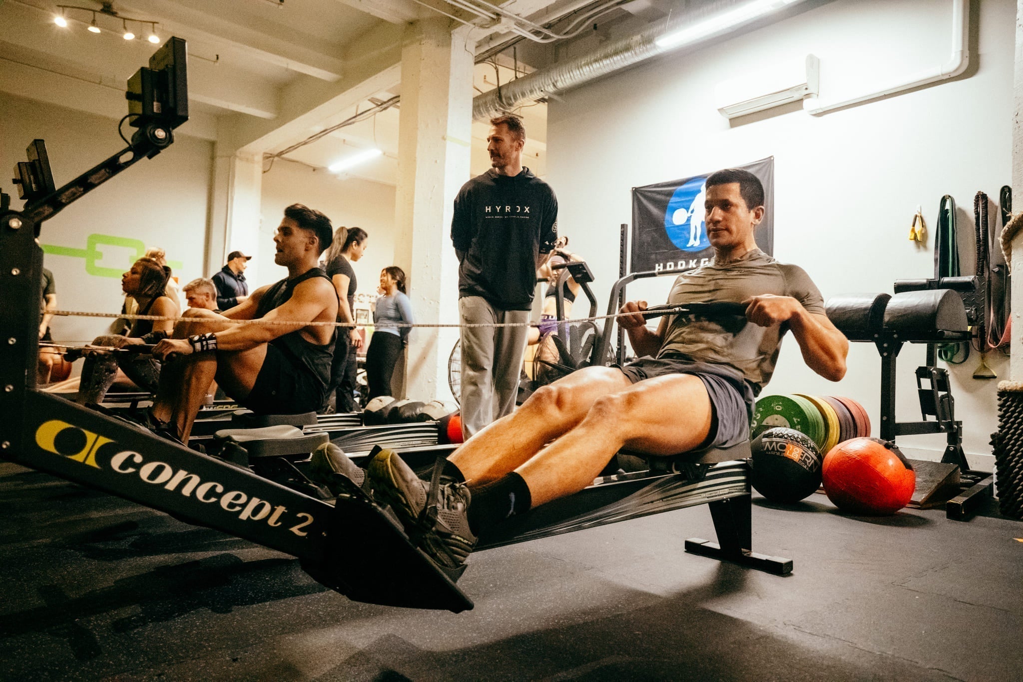 Athletes on rowing machines