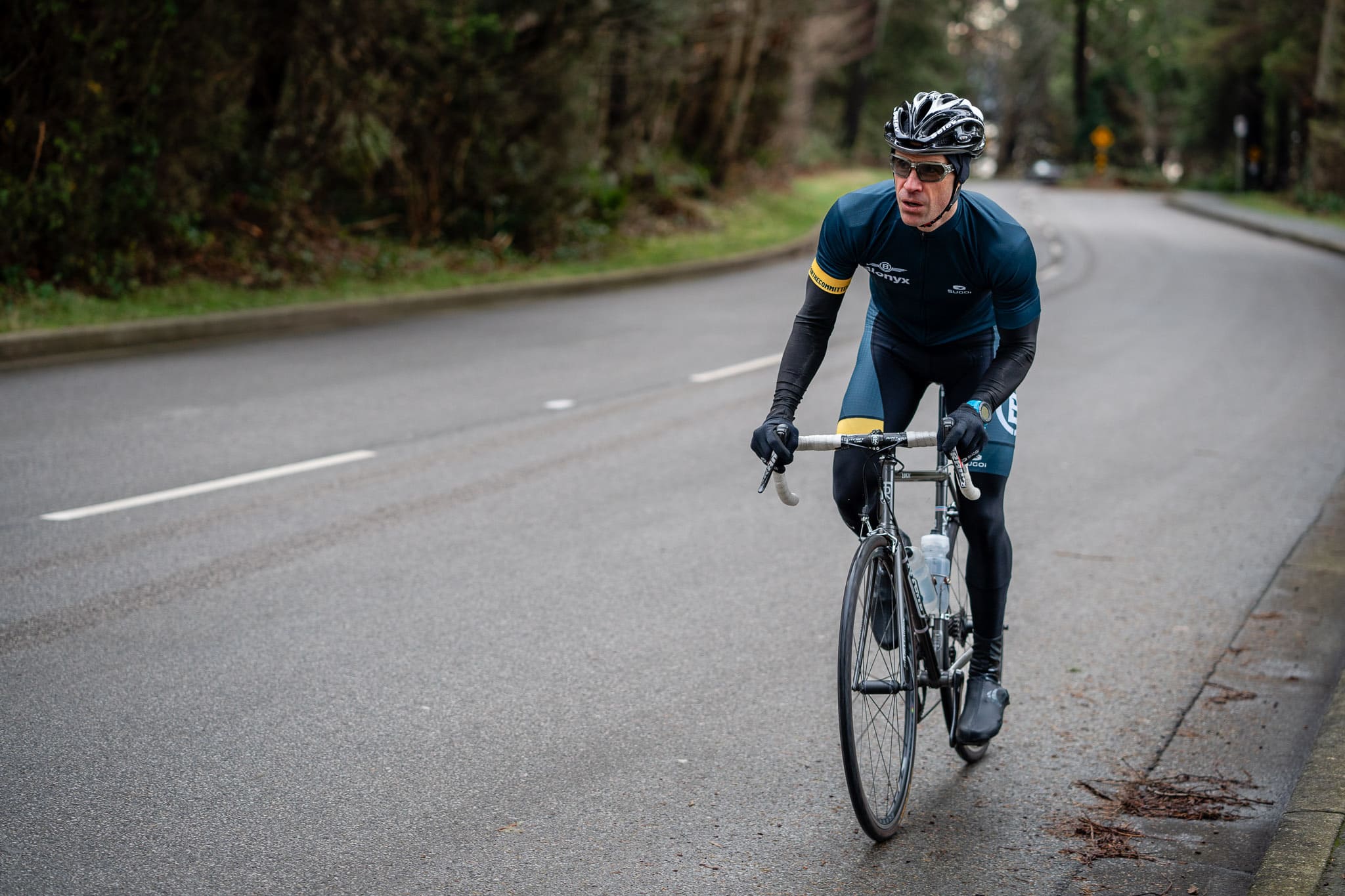 Cyclist on a road wearing a Blonyx Kit