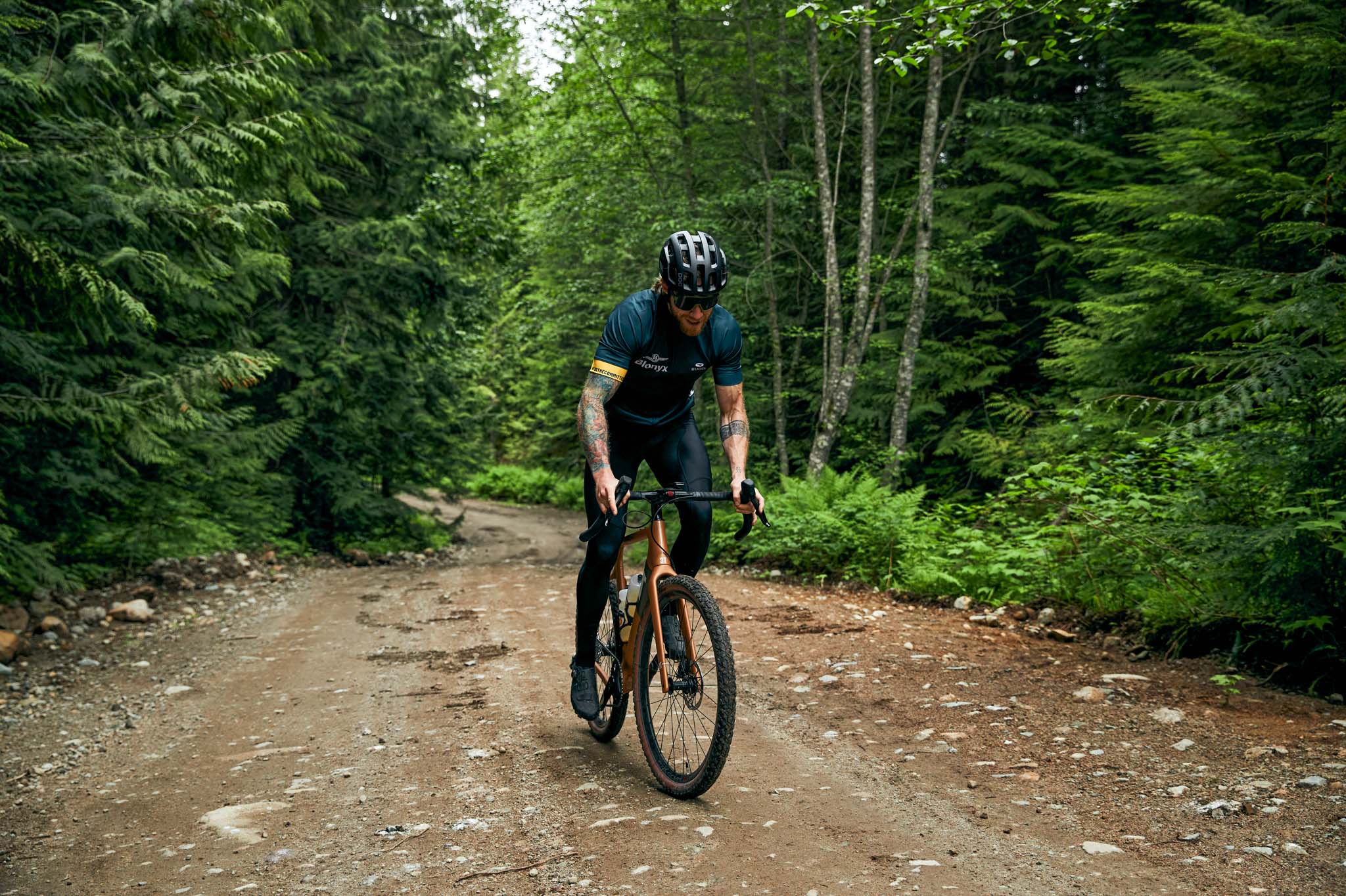 Mountain biker riding through the forest