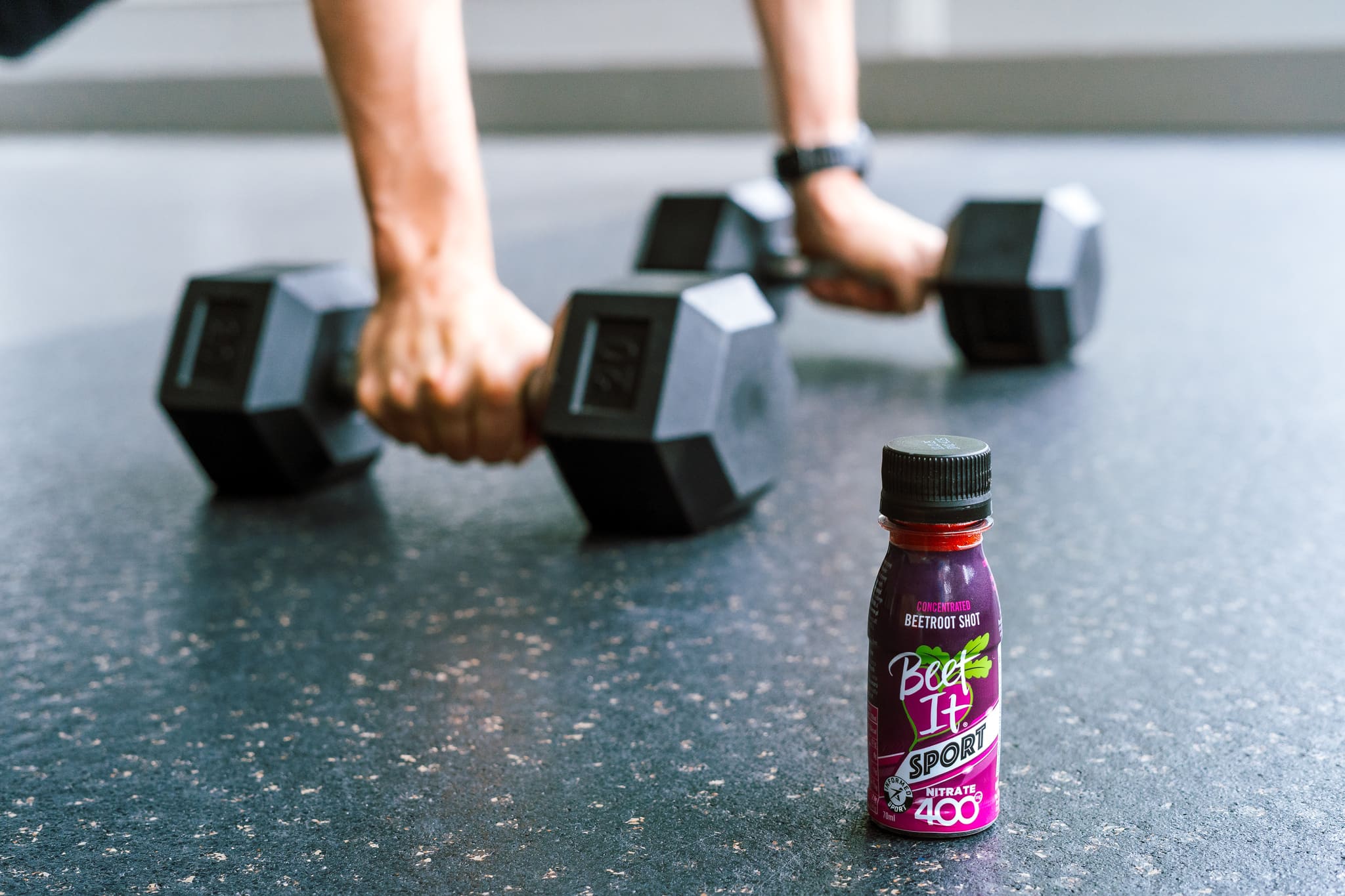 Beet It Sport Nitrate 400 and someone Planking with Dumbells