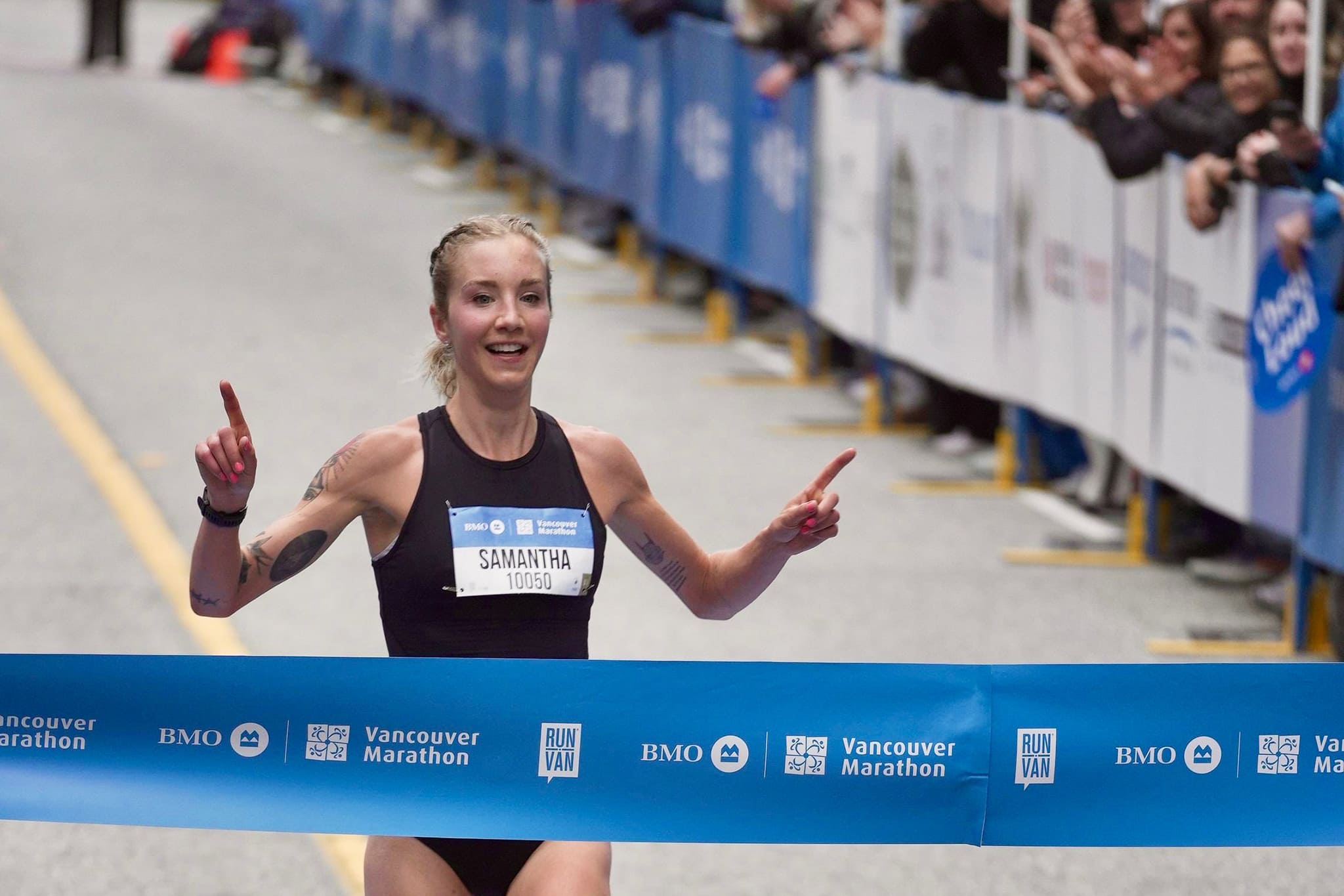 Samantha Jory Breaking the Tape at the BMO Marathon