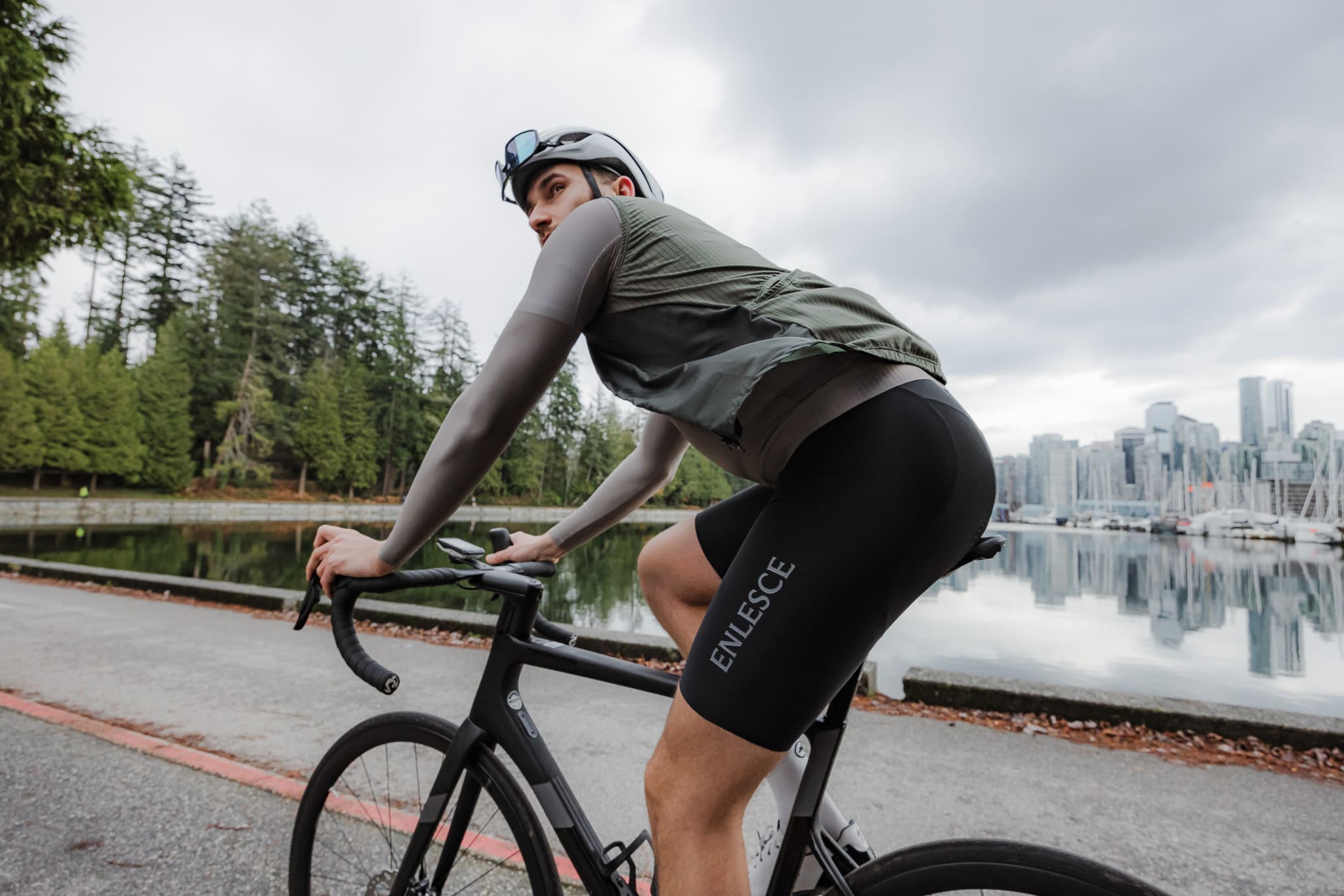 Daniel Barslund in ENLESCE Apparel riding on the Vancouver Seawall