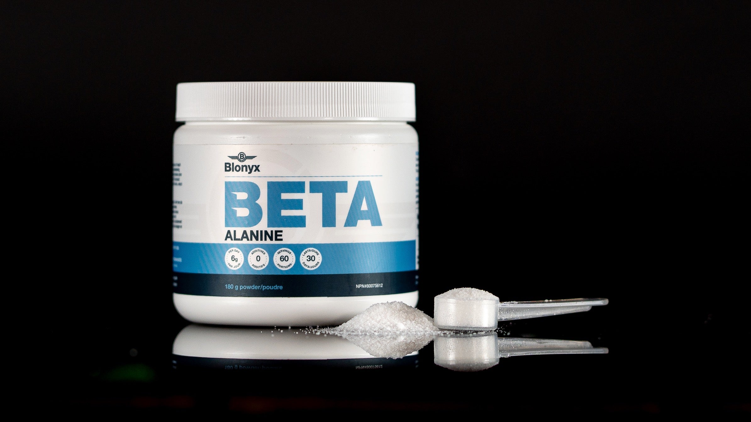 Blonyx Beta Alanine package and a scoop of the beta-alanine on a black background