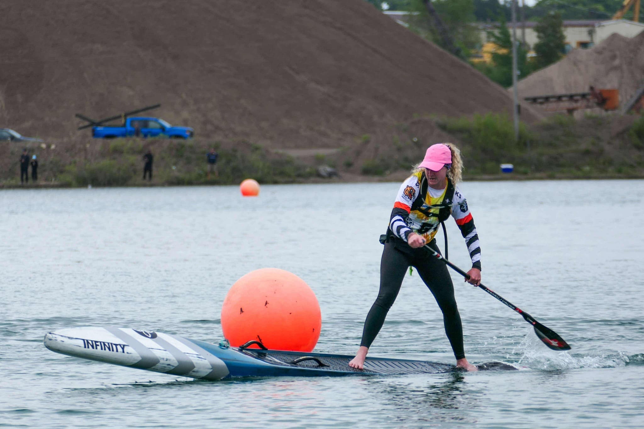 Caroline Cook Racing a Standup Paddle Board