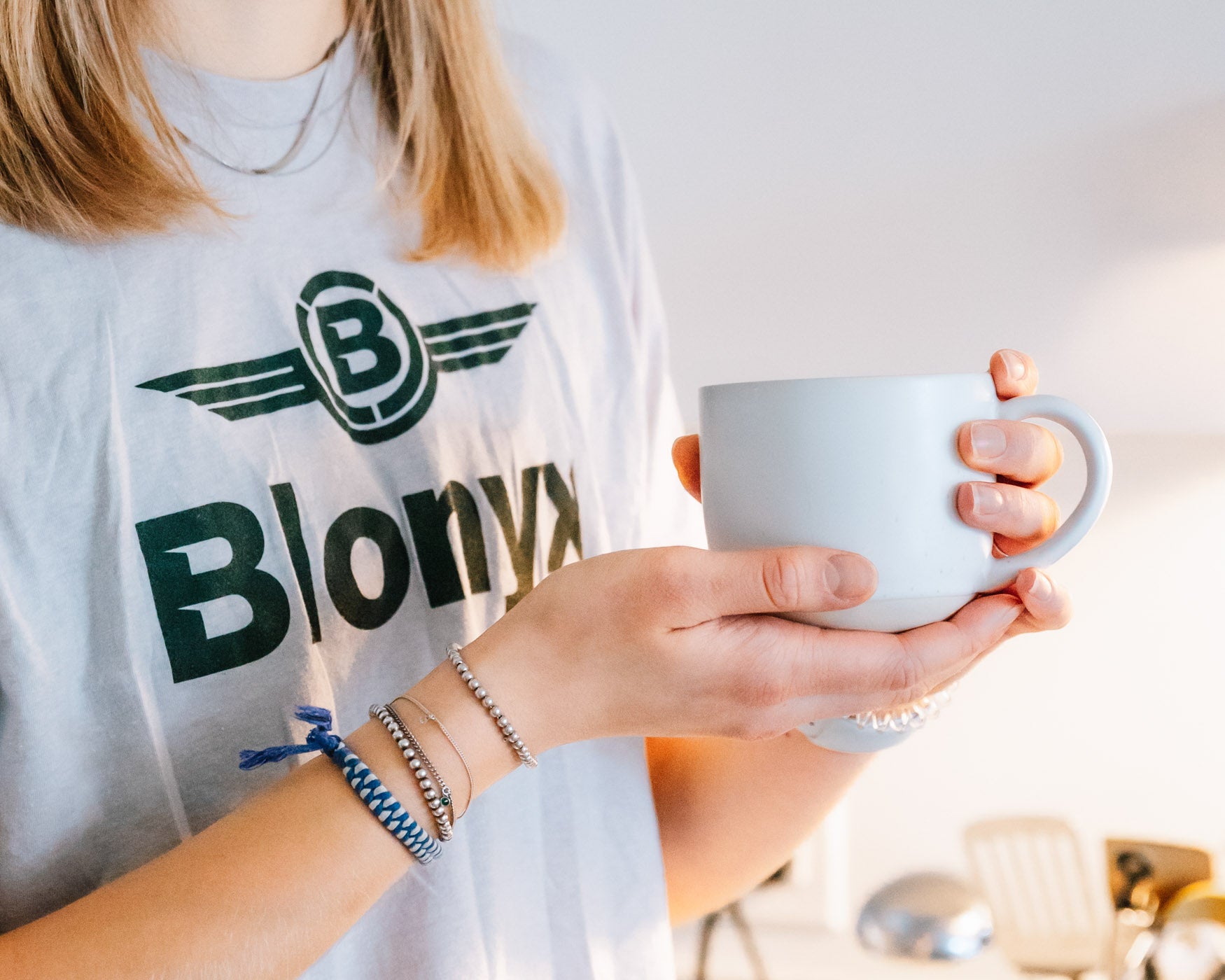 Athlete holding a cup of coffee