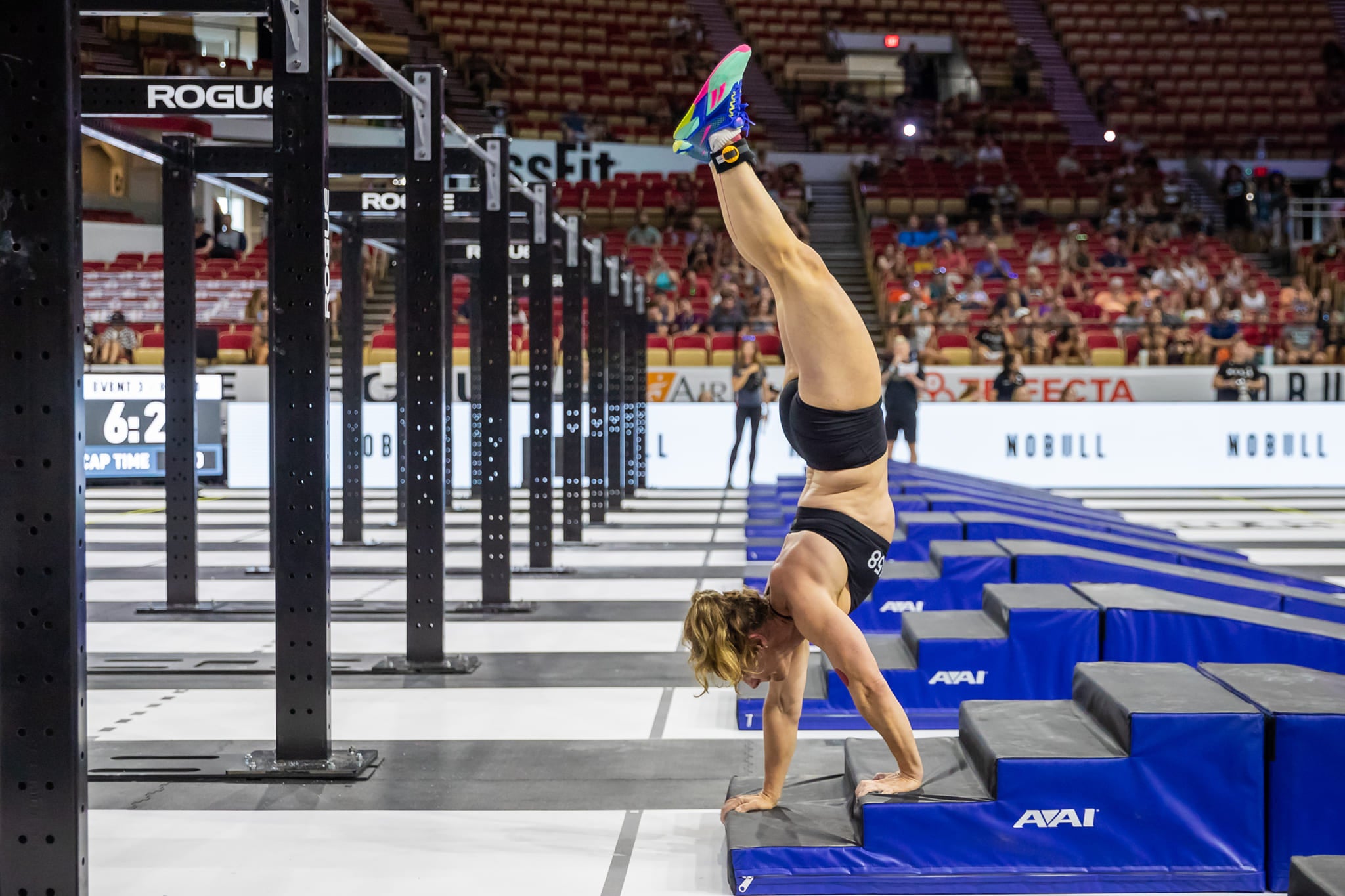 10x CrossFit Games athlete Jen Dieter doing a handstand