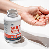 Holding Blonyx Multivit+ capsules in a hand